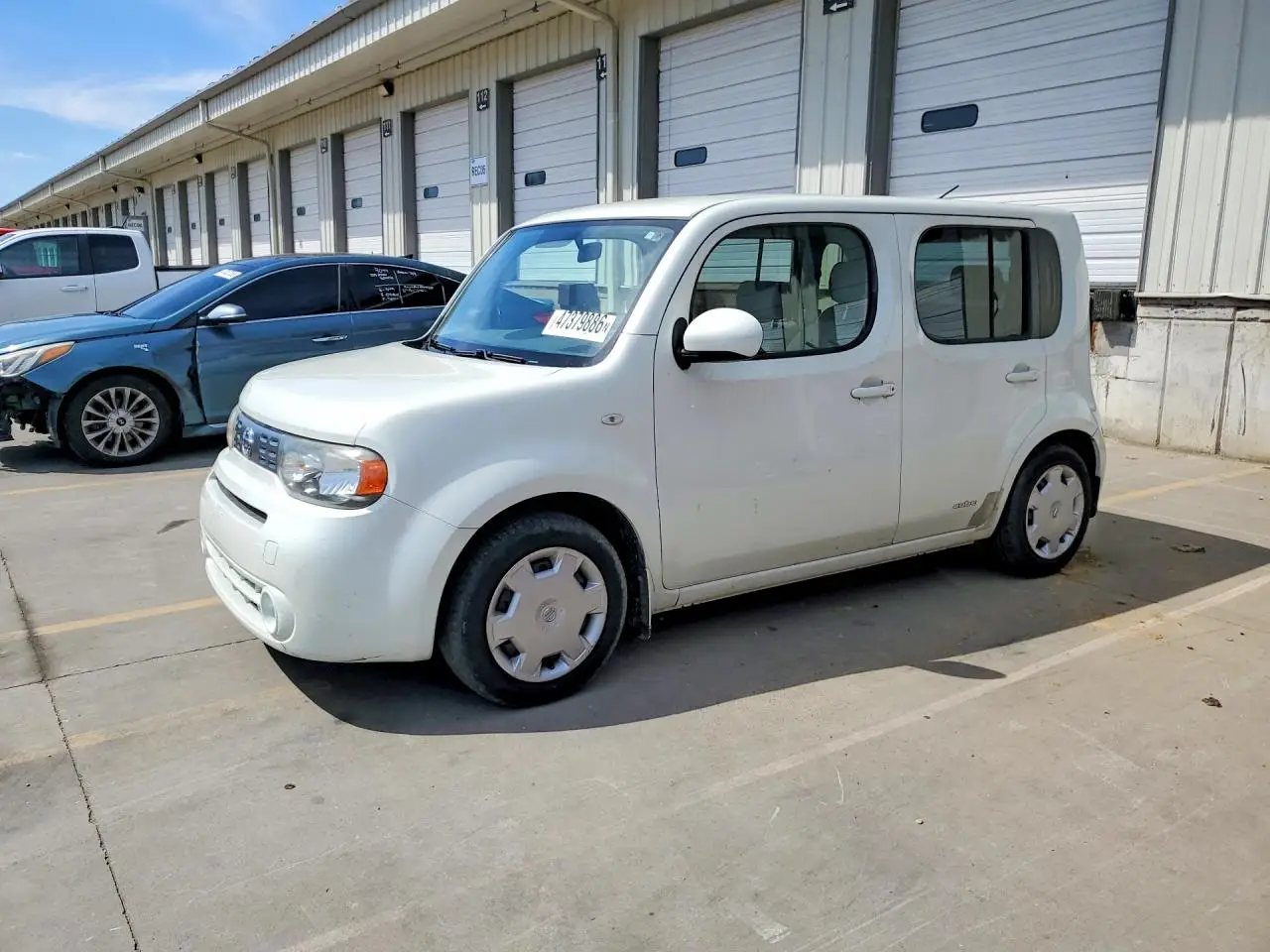 NISSAN CUBE 2010. Lot# 47379886. VIN JN8AZ2KR8AT163551. Photo 1