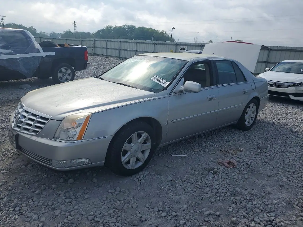 CADILLAC DTS 2006. Lot# 47696526. VIN 1G6KD57Y26U123955. Photo 1