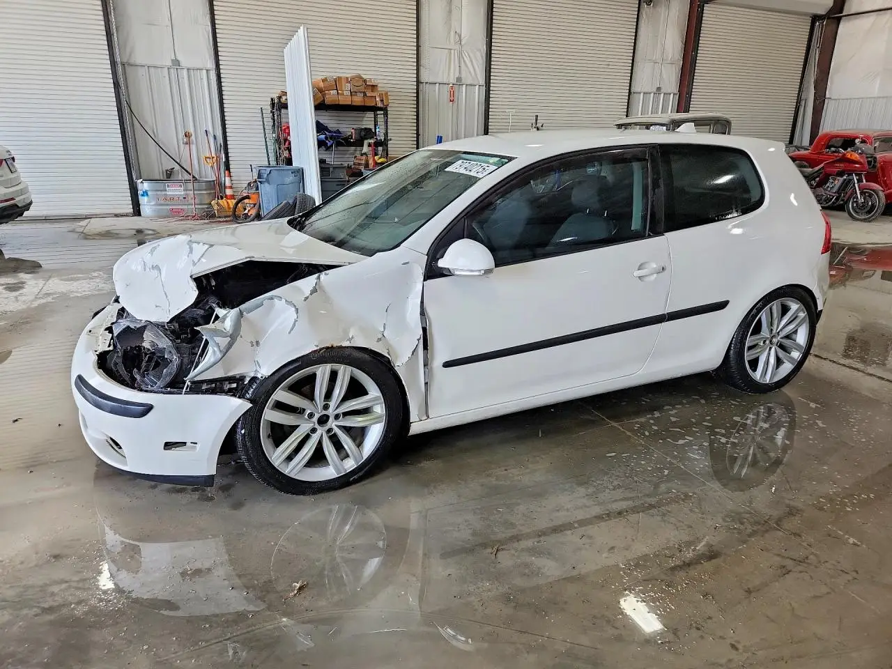 VOLKSWAGEN RABBIT 2009. Lot# 79740215. VIN WVWAA71K39W048824. Photo 1