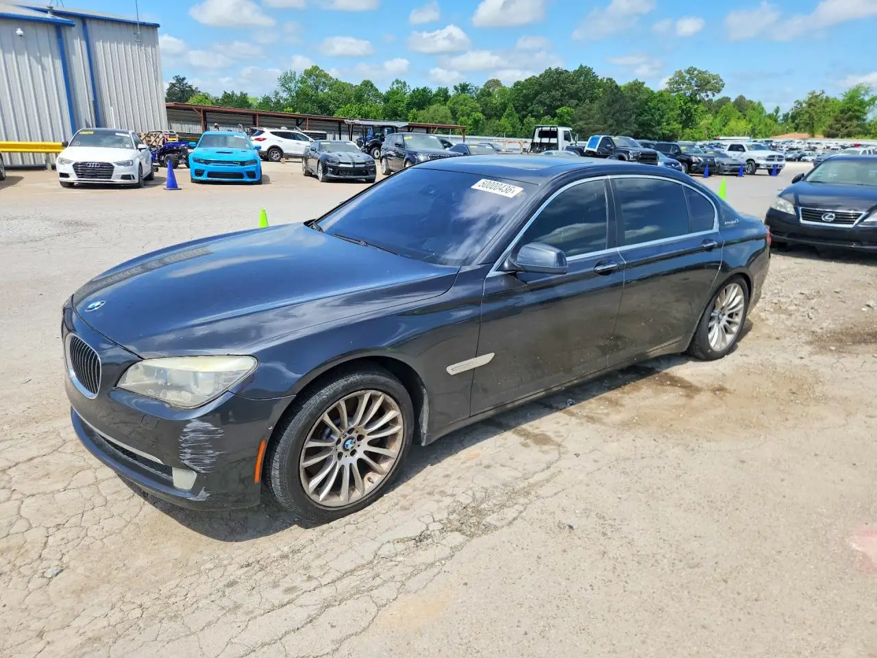 BMW 7 SERIES 2011. Lot# 50000436. VIN WBAKX8C57BC198391. Photo 1