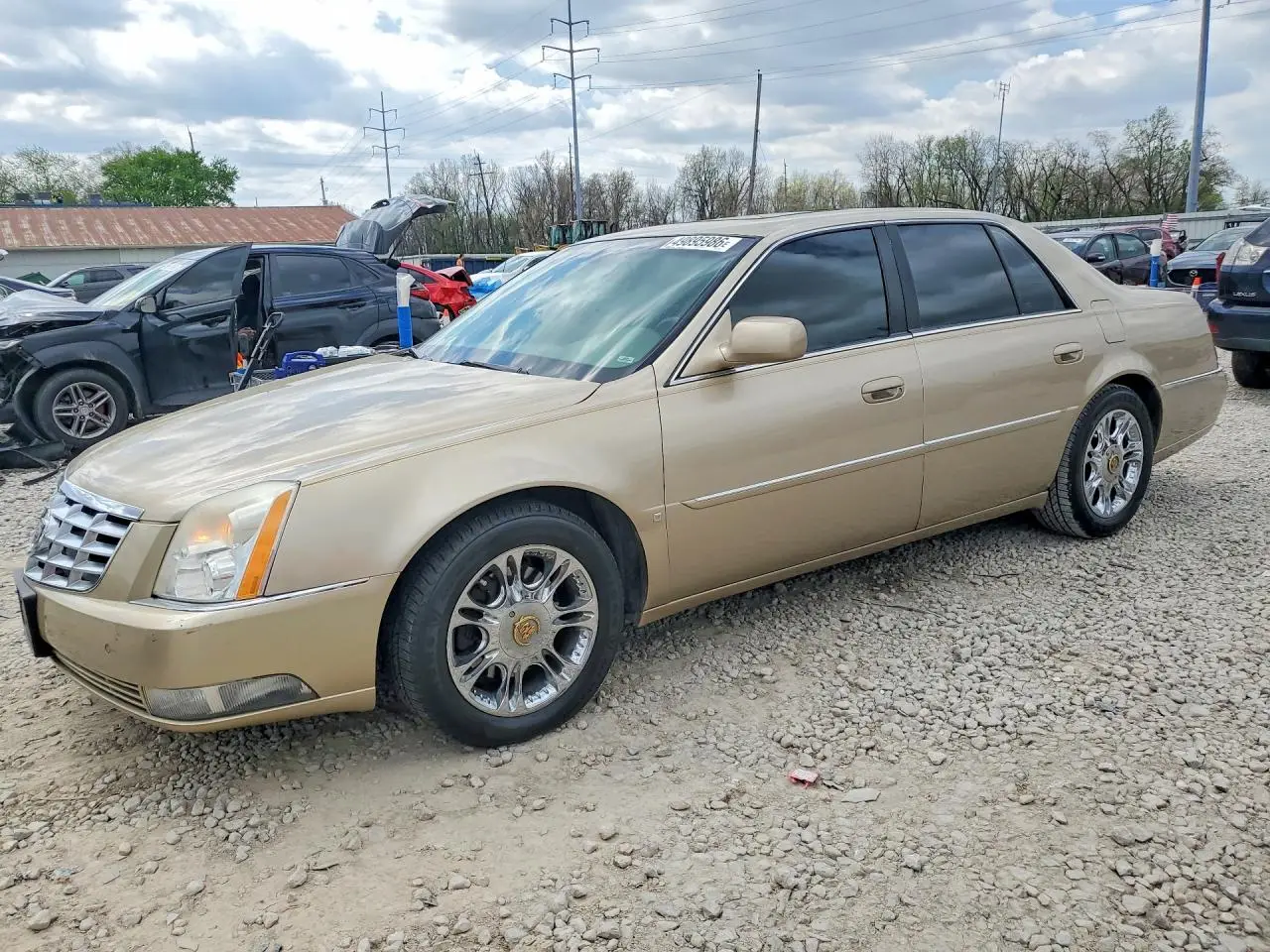 CADILLAC DTS 2006. Lot# 49895986. VIN 1G6KD57Y26U185999. Photo 1