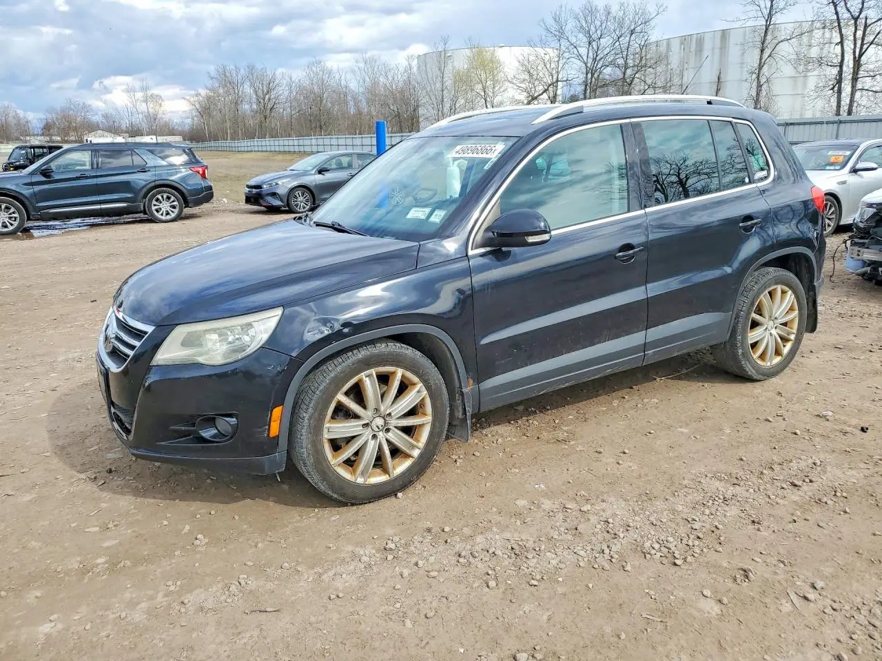 VOLKSWAGEN TIGUAN 2011. Lot# 49896866. VIN WVGBV7AX6BW554623. Photo 1