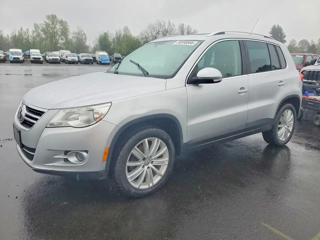 VOLKSWAGEN TIGUAN 2011. Lot# 50950666. VIN WVGAV7AX2BW547521. Photo 1