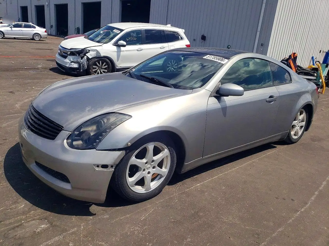 INFINITI G35 2003. Lot# 51785906. VIN JNKCV54E53M221770. Photo 1